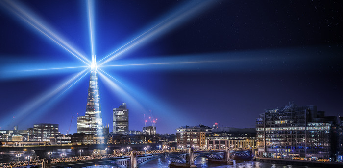 Shard at night with lightning beams coming out showing the pattern of the union flag