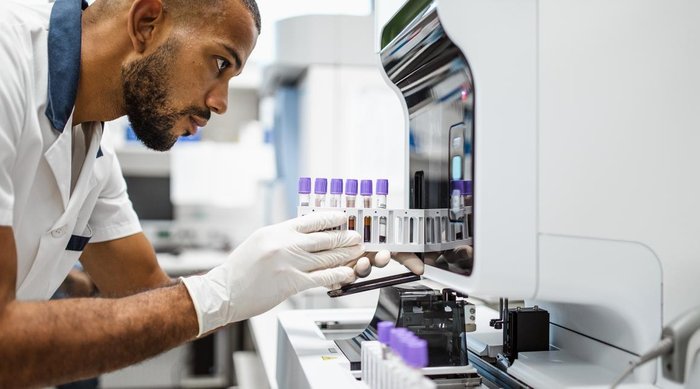 life science male lab tech_stock